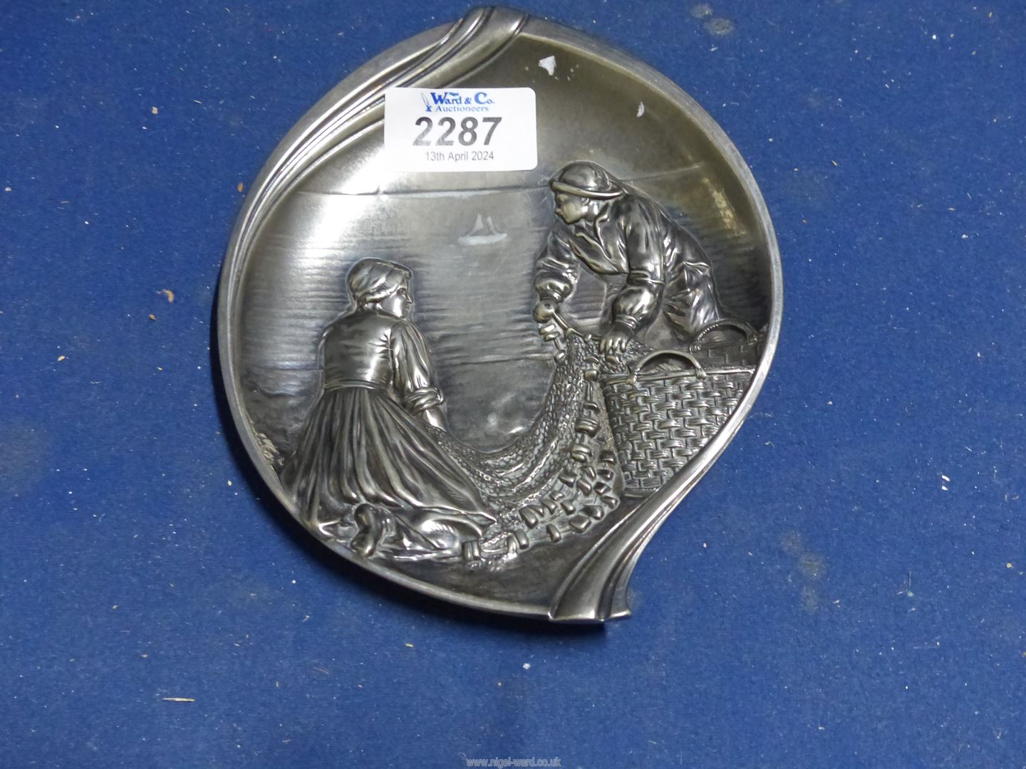 An antique WMF Germany silver plate/pewter Dish having decoration of fisherman and woman,