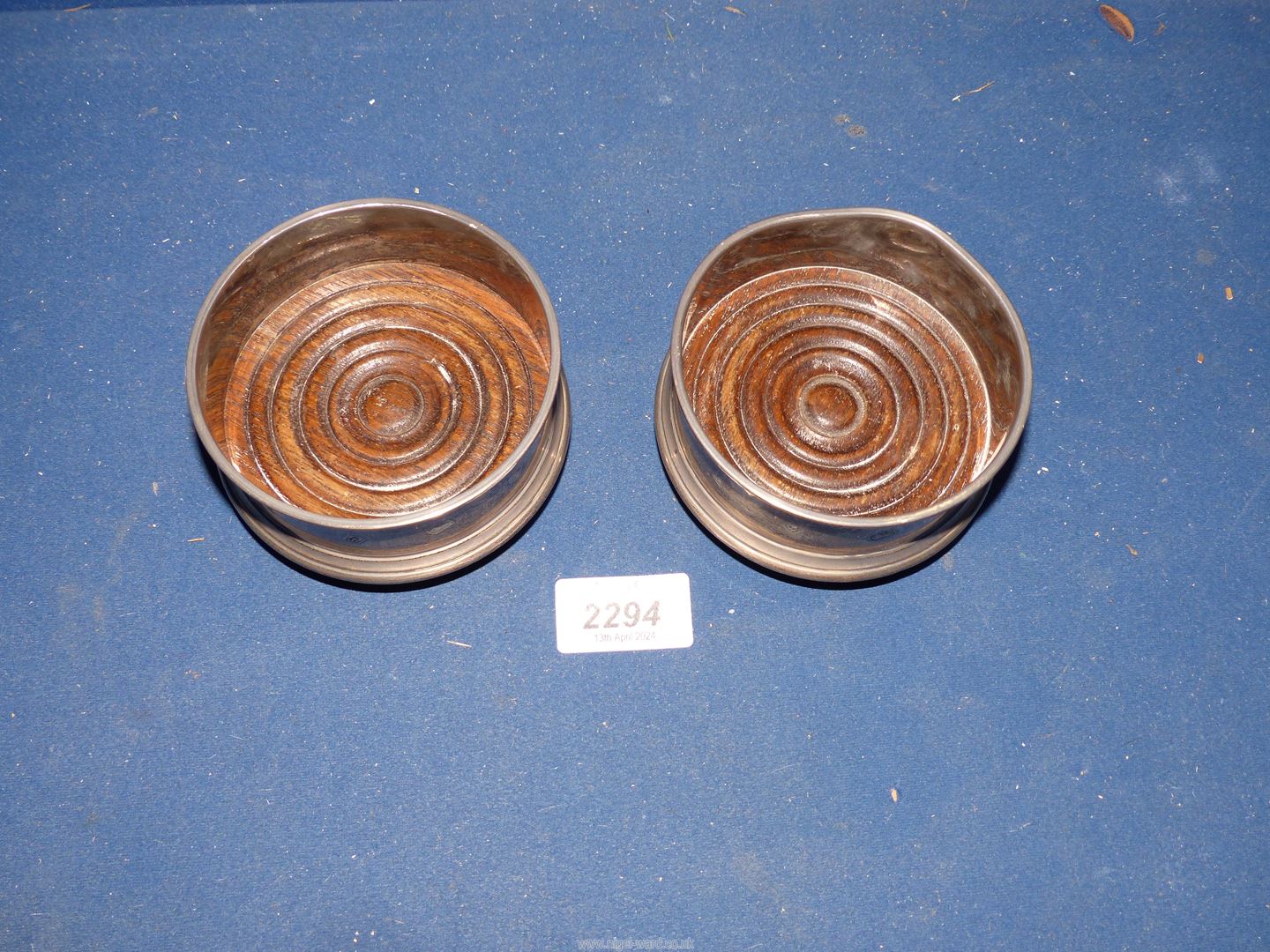 A pair of Birmingham Silver bottle coasters with wooden bases 1988 by Argil Silver, one dented. - Image 2 of 3