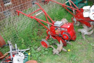 A 'Wolseley Merrytiller' Rotavator with Briggs & Stratton 4 stroke engine (no spare tiller feet).