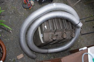 3" metal flexible hose and four jerry cans.