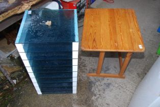 Stationery shelving and a small child's desk.