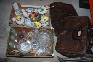 A box of china and a box of glass and 2 leather carriers.