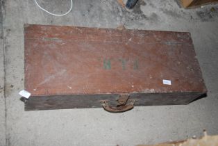 A carpenters tool box with saw, wooden mallet, draw knife etc.