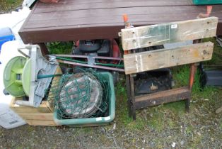 Wooden planter, hose on reel, edging shears, plastic square planter and a Workmate.