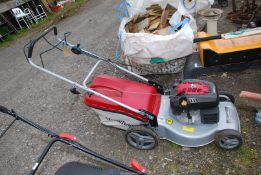 A Mountfield propelled mower SP533 overhead valve engine (pull cord not working).