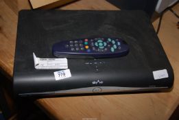 A Sky+ HD box with remote.