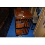 A Mahogany and Walnut revolving bookcase.