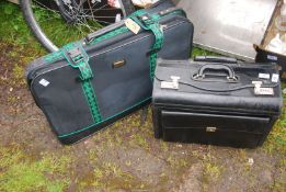 A combination case and a suitcase.