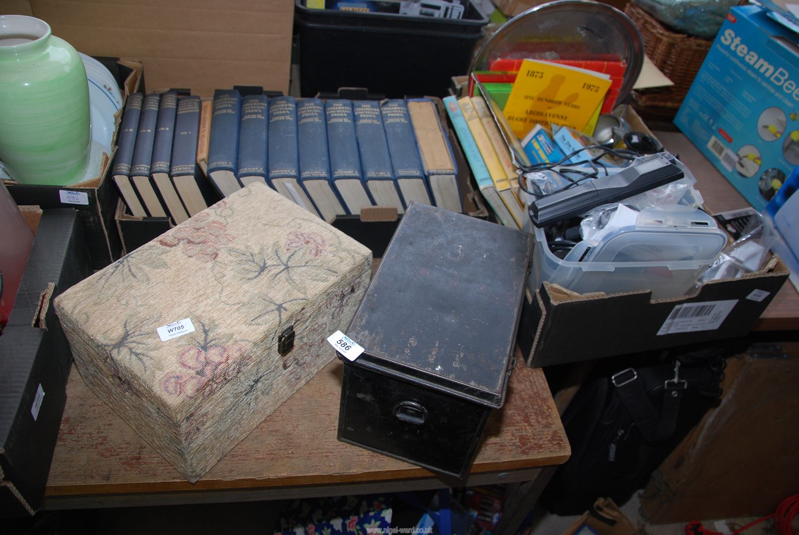 A box of 'Walt Disney Parade' books, encyclopaedias, metal box, 4 piece metal tea set etc.
