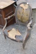 Old leather upholstered Armchair for restoration.