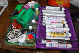 A container of garden fluids and a container silicone & Puraflex.