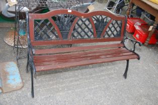 A garden bench with Cast Iron bench ends and back. 49 1/2" wide x 30" high.