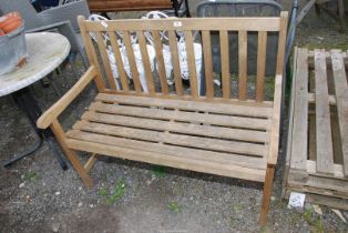 A garden bench, 43" wide x 34" high.