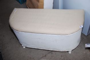 A Lloyd loom style Ottoman