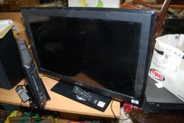 A flatscreen TV SOny model KOL-32S 5500, with remote.