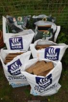 Six small bags of parquet flooring.