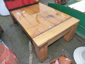 A large low table, 49 1/2'' wide x 26" high.