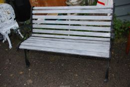 A Cast Iron ended garden bench, 51" wide x 29" high.