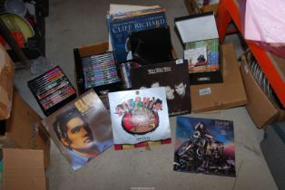 A quantity of LP's including Meat Loaf, Elvis, Wet Wet Wet, etc. plus quantity of DVD's.