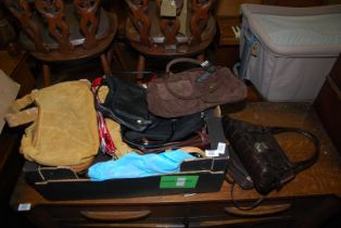 A box of mixed handbags, some real leather.