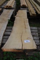 A length of Oak Rough Cut timber board 18" wide x 126" long.