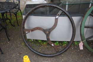 A hand drive cast iron fly wheel/drive wheel, 38" diameter. ***V.A.T.