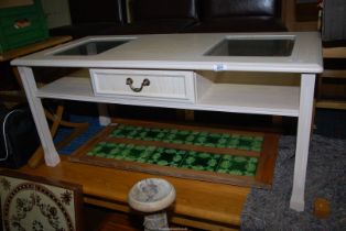 A coffee table with a drawer 43" wide x 20" deep x 19" high.