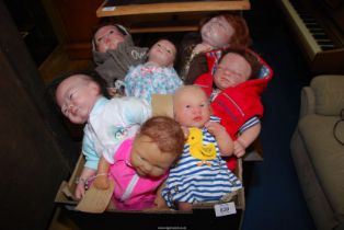 A quantity of 'Re-born' baby dolls.
