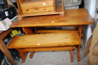 A pine TV stand and a pine table 23" x 44 1/2" and two benches and a canvas shoe holder.