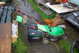 A 'Florabest' 240 volt electric mower with grass box. SOLD as SEEN - not working.