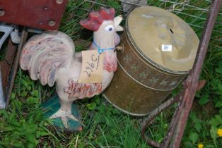 A cockerel, fibre glass & brass coal bucket.