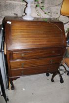 A mahogany bureau with two drawers to base, 30" wide x 18" deep x 40 1/2" high.