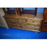 A Pine Sideboard with three frieze drawers over four long drawers, 60'' long x 28'' high.