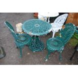 A circular Aluminium table and two chairs painted green, 27" high x 25 1/2" high.