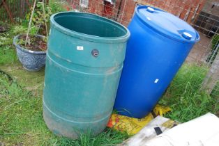 Two water butts, one with tap.