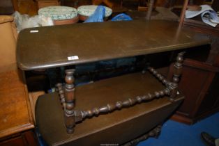 A dark Oak coffee table, 41 1/2'' x 18'' x 18 1/4'' high.
