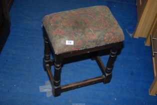 An upholstered stool