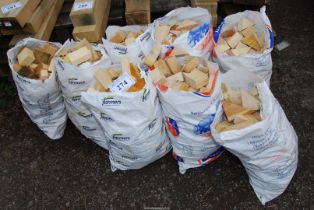 Eight small bags of softwood off cuts.
