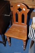 An Oak Chapel style chair.
