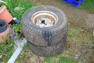 A pair of wheels and tyres 23/10 50-12.