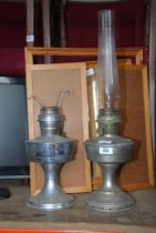 Two oil filled lamps.