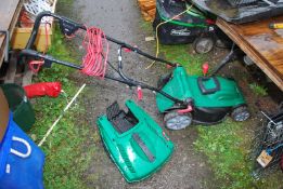 A Qualcast electric mower with grass box.