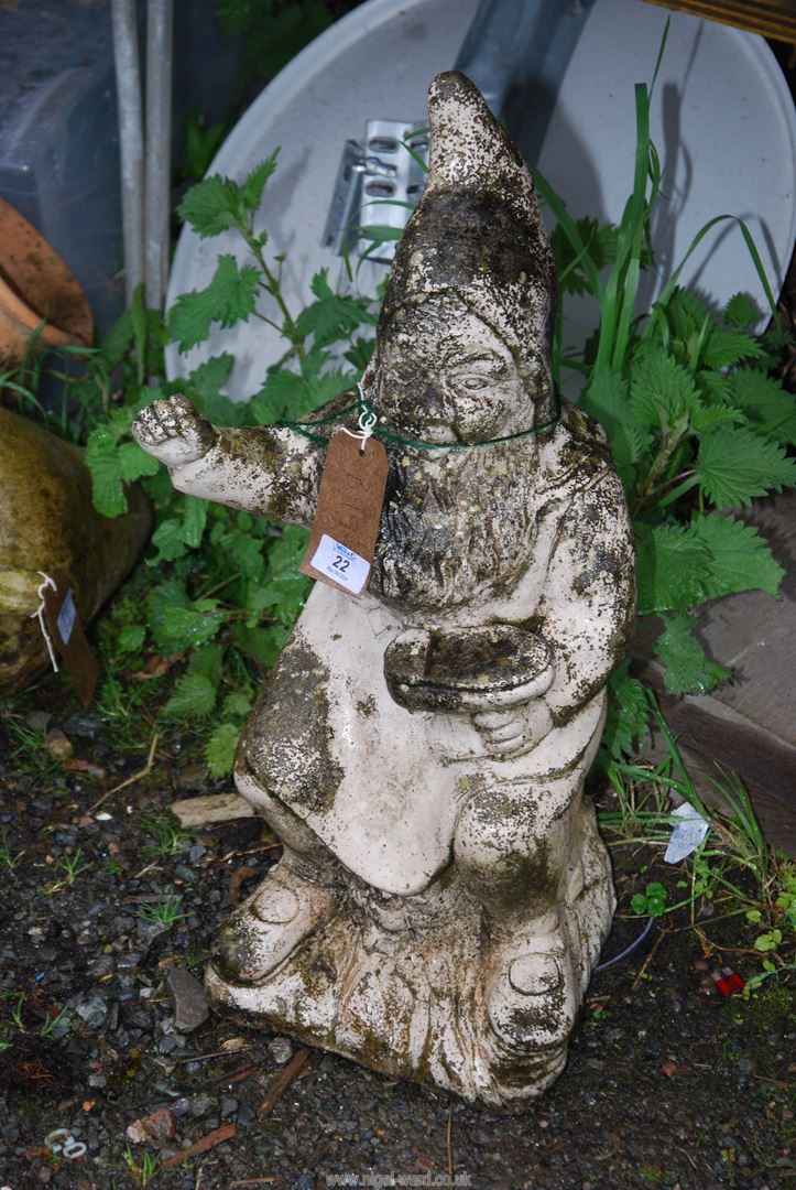 A garden concrete gnome, 23 1/2" high.