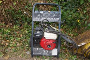 A petrol driven pressure washer with four stroke engine (engine turns ok).