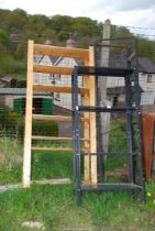 Two metal and wooden shelf units.