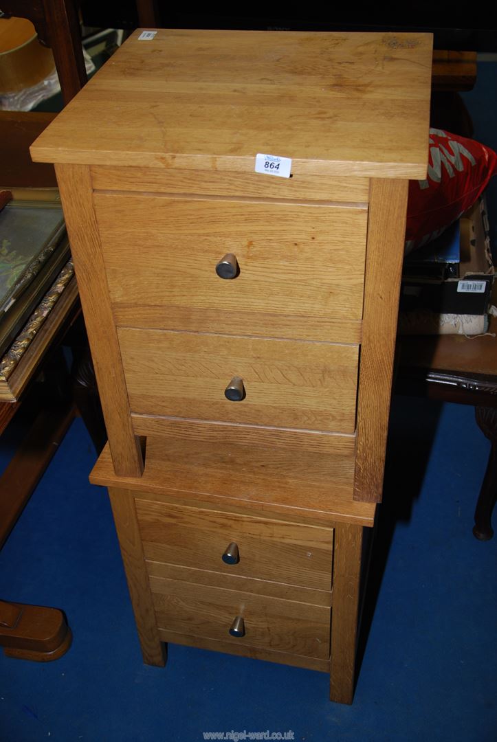 A pair of Oak Bedside Cabinets.