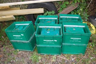 A quantity of plastic storage containers.