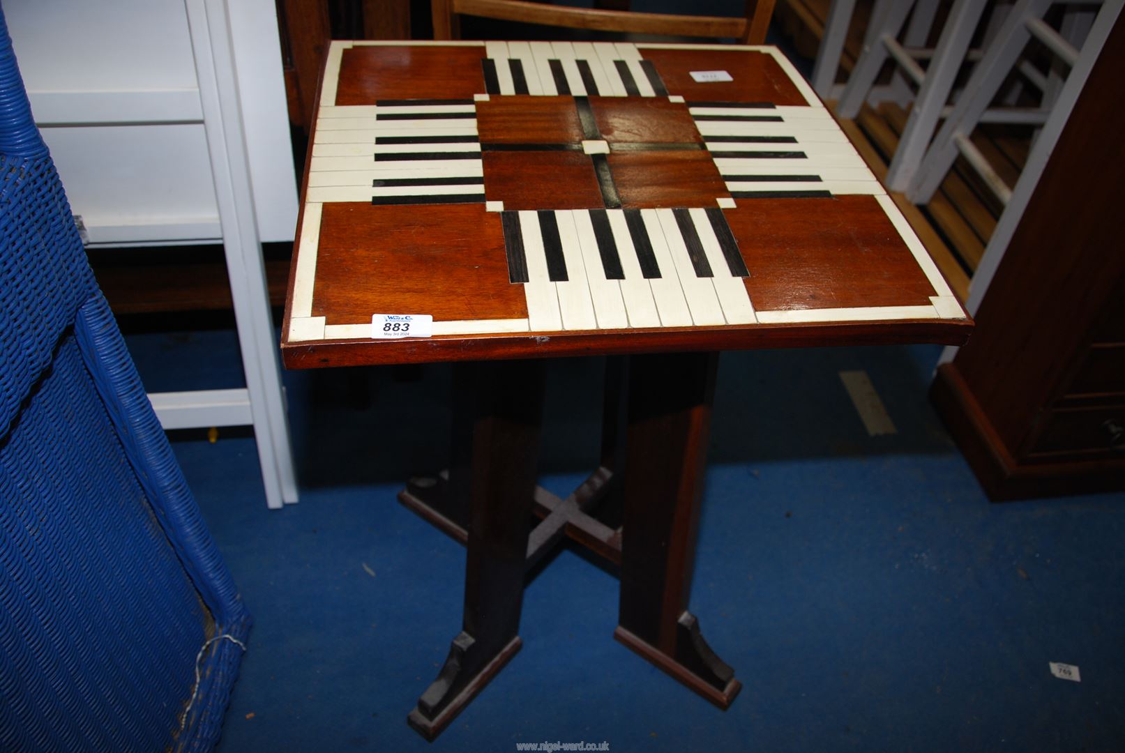 A Piano key topped occasional table, 18 1/4'' square x 24 3/4'' high.