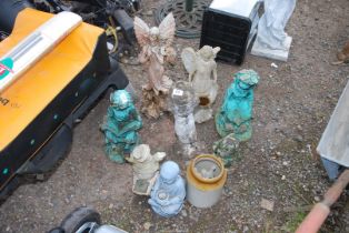 A quantity of garden ornaments - concrete and fibre glass, angels, frog etc.
