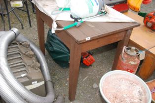 A side table with drawer, 3' x 25" x 30" high.